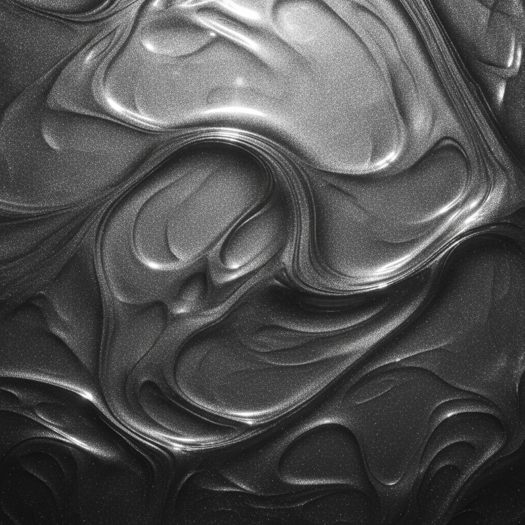 Ripples in a silver liquid catching the light